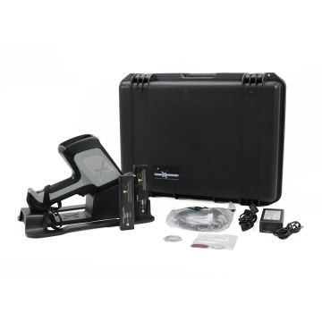 Olympus Innov-X DELTA Classic DC-2000 handheld XRF analyzer with docking station and accessories.